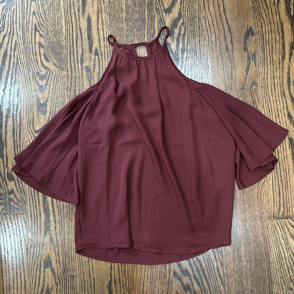 Maroon colored open shoulder blouse
